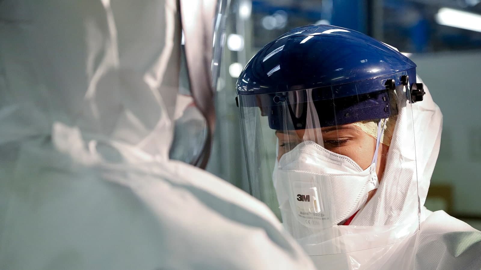 Wiki File:Checking Personal Protective Equipment (PPE) in the fight against Ebola ( ) in the ( ) DFID - UK Department for International… — contextual file photograph
